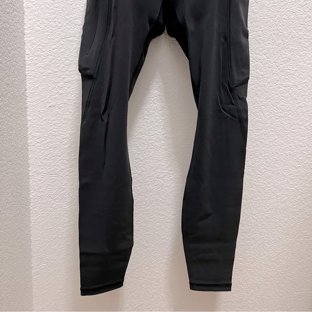 Athleta legging with side pockets and zipper, gently used, fits 5’4” range